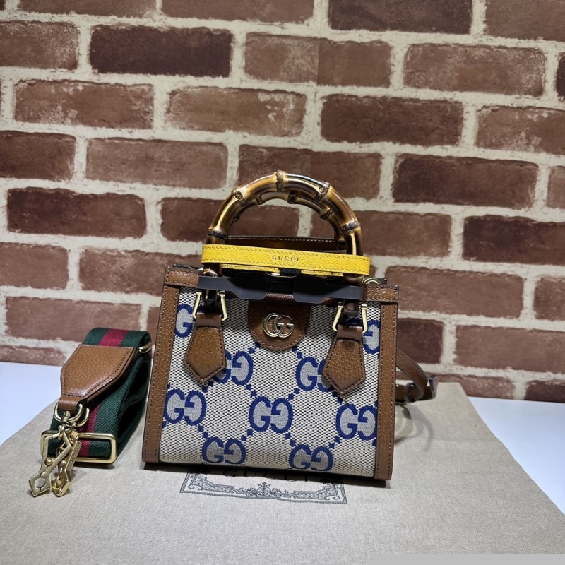G*u*i top handle bags